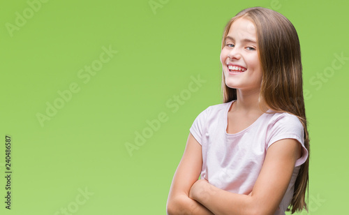 Young beautiful girl over isolated background happy face smiling with crossed arms looking at the camera. Positive person. © Krakenimages.com