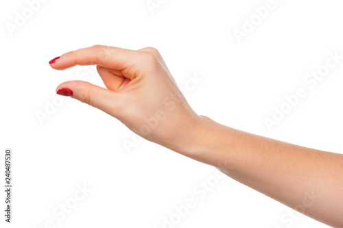 Female manicured hand measuring invisible items, woman's palm making gesture