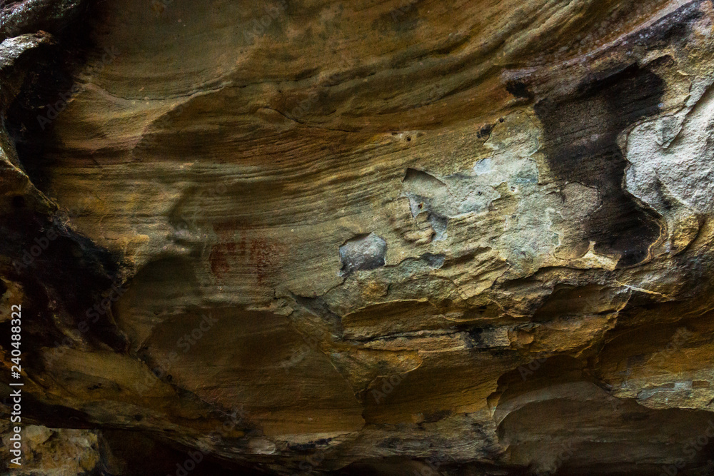 Aboriginal man hand print in the Red Hands cave in Ku-ring-ai Chase National Park, Sydney, Australia.