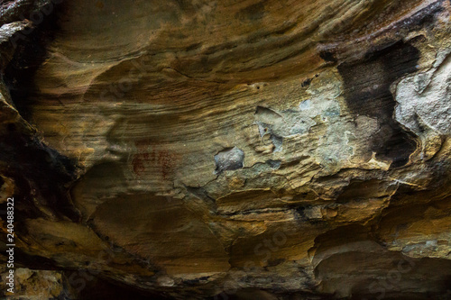 Aboriginal man hand print in the Red Hands cave in Ku-ring-ai Chase National Park, Sydney, Australia.