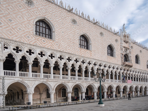 VENICE, ITALY, NOV 1st 2018: Doges Palace detailed facade or exterior perspective view. Ancient Italian renaissance architecture. Famous historic venetian landmark on San Marco Square or Piazza Nobody © Oxana