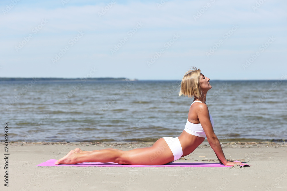 Young sporty beautiful girl yoga training Young sporty beautiful girl yoga training