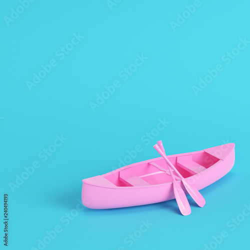 Pink canoe with paddles on bright blue background in pastel colors