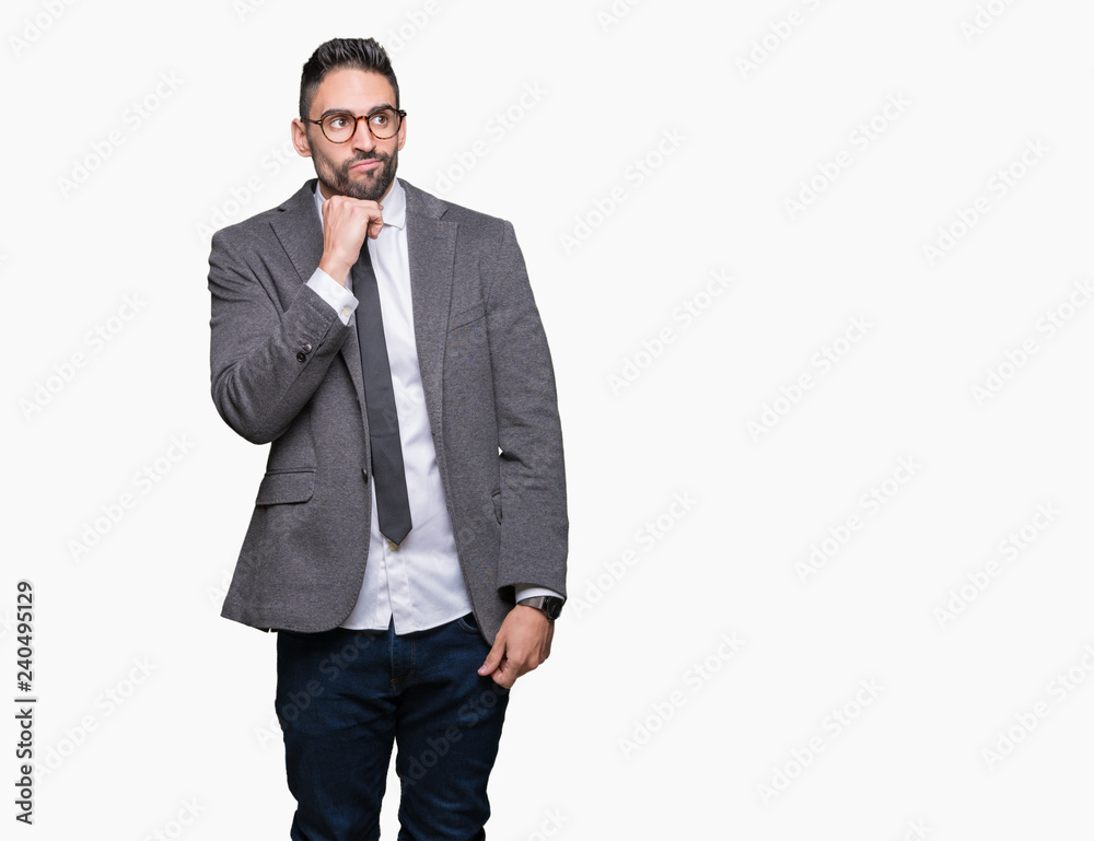 Young handsome business man over isolated background with hand on chin thinking about question, pensive expression. Smiling with thoughtful face. Doubt concept. Young handsome business man over isolated background with hand on chin thinking about question, pensive expression. Smiling with thoughtful face. Doubt concept.