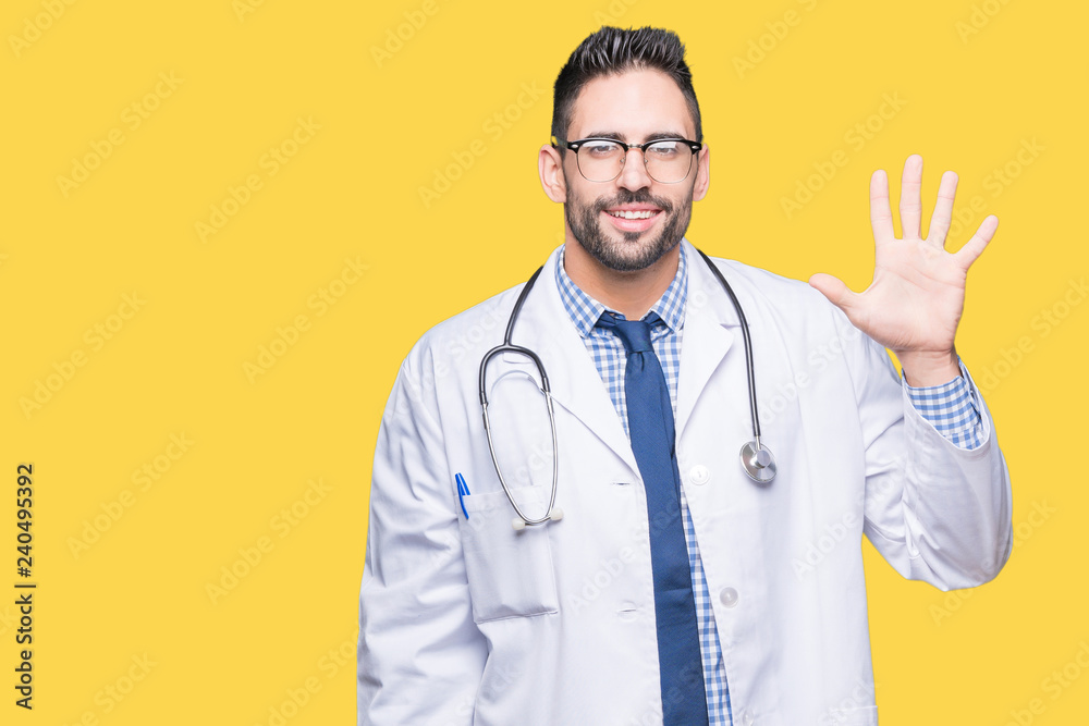 Handsome young doctor man over isolated background showing and pointing up with fingers number five while smiling confident and happy. Handsome young doctor man over isolated background showing and pointing up with fingers number five while smiling confident and happy.