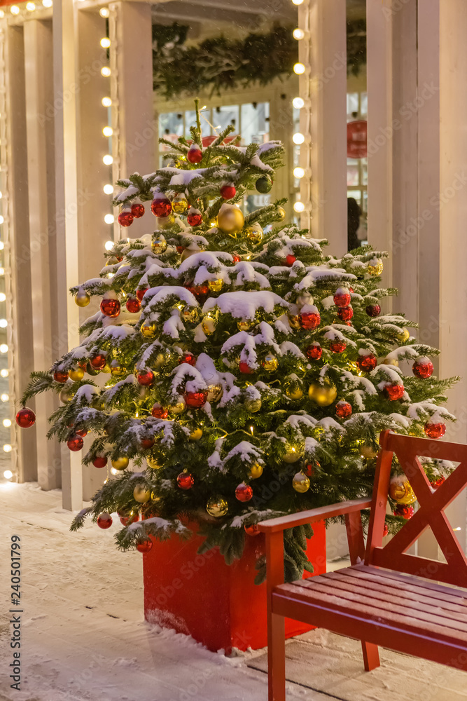 Illuminated and decorated Christmas tree