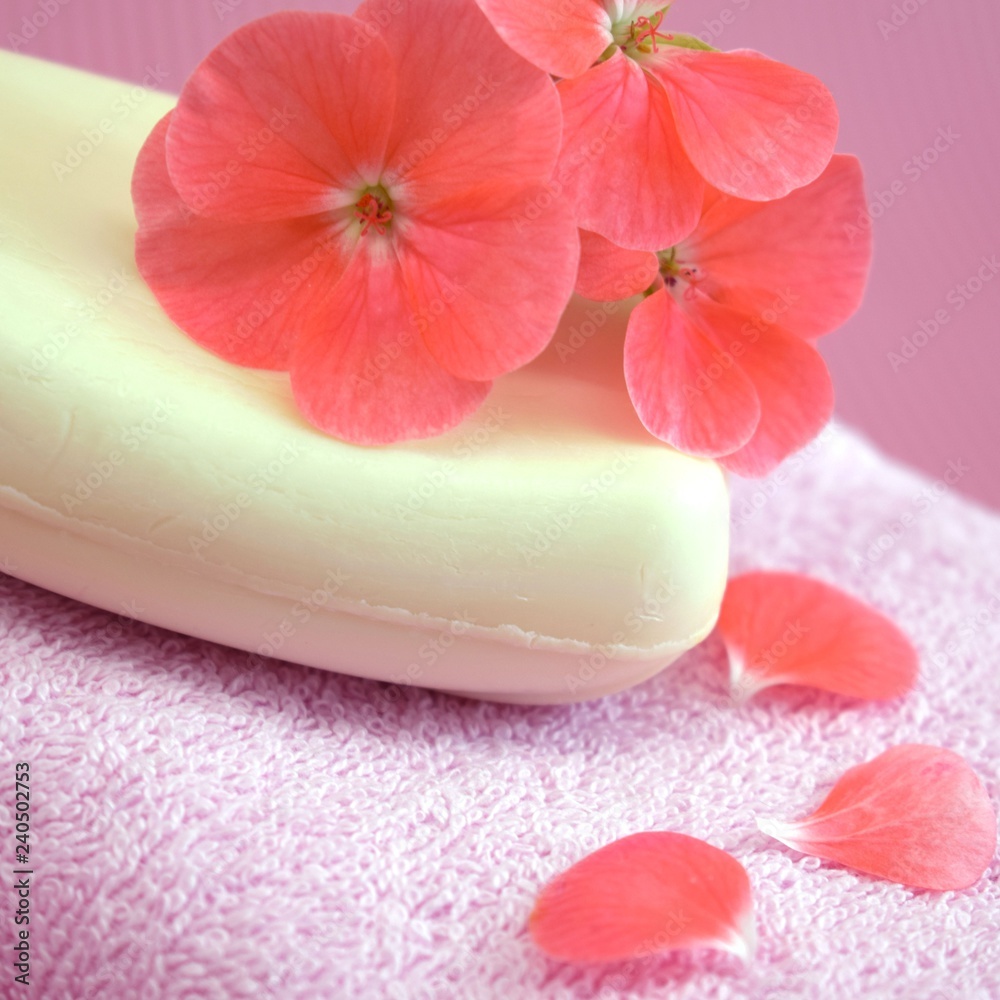Fragrant flower soap on a pink towel. Fragrant flower soap on a pink towel.