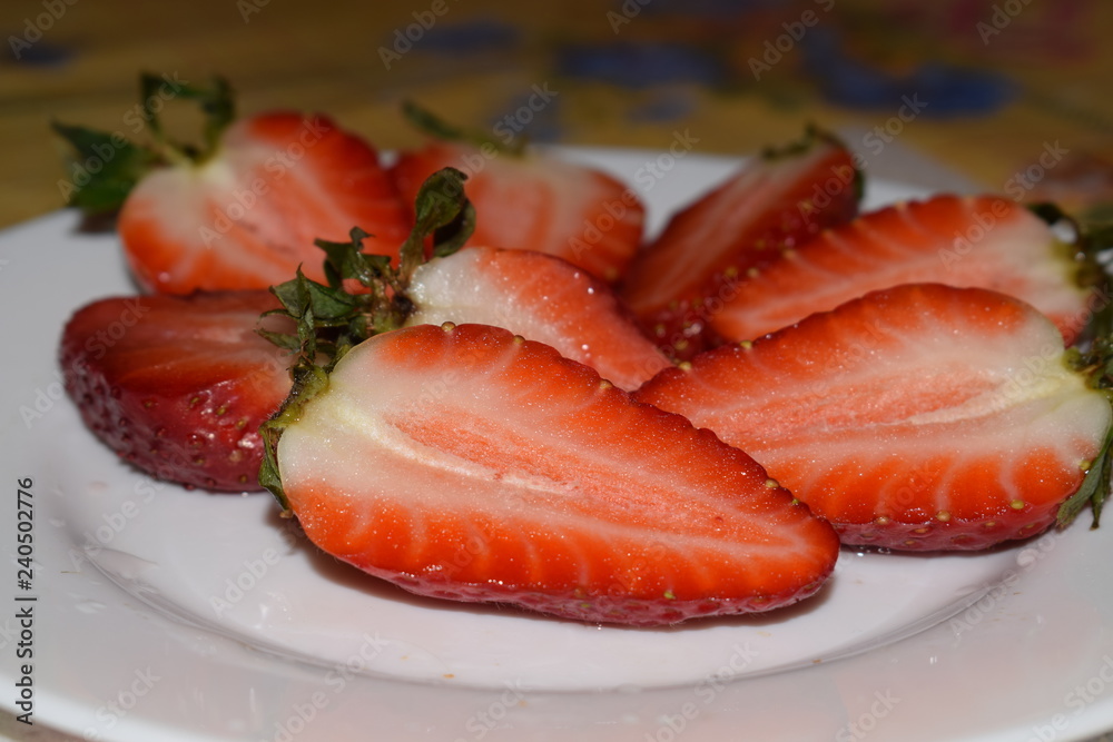 Red strawberries on a plate