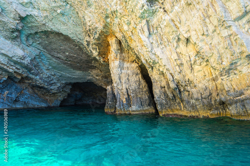 Greece, Zakynthos, Turquoise water and cavern in white chalk rocks near keri