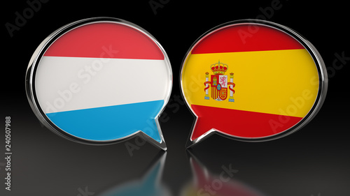 Free Download Luxembourg and Spain flags with Speech Bubbles. 3D illustration - GFXLoad