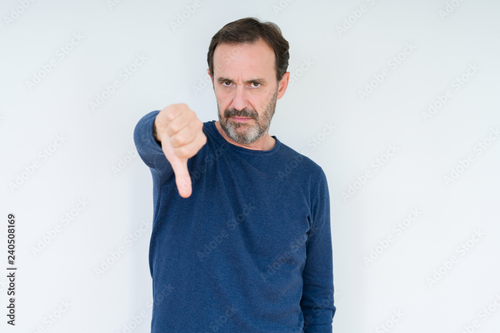 Elegant senior man over isolated background looking unhappy and angry showing rejection and negative with thumbs down gesture. Bad expression. Elegant senior man over isolated background looking unhappy and angry showing rejection and negative with thumbs down gesture. Bad expression.