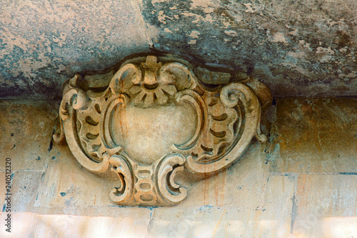 Architectural details on building, stone carving, aesthetic frills. photo