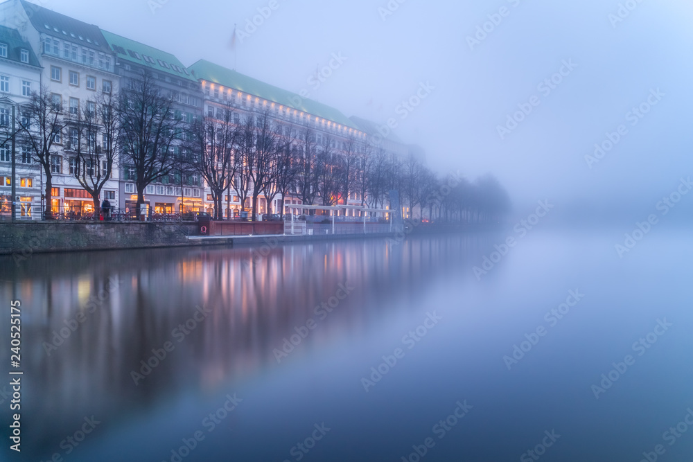 The lake Inner Alster (German: Binnenalster) in Hamburg, Germany, in the fog.