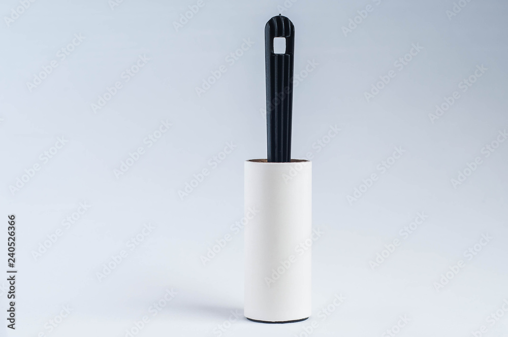 roller for cleaning clothes on a white background roller for cleaning clothes on a white background