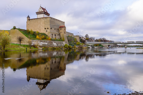 Sightseeing of Estonia. Beautiful autumn view of Narva Castle with tall Herman's tower, Narva, Estonia