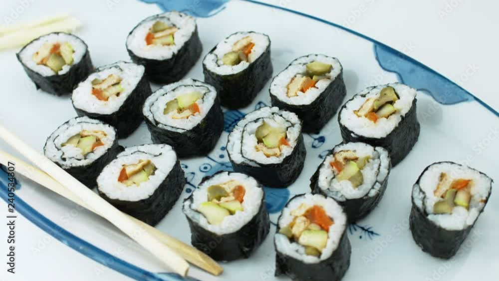 A Plate of Sushi Arranged Into a Fish Plate Overhead View A Plate of Sushi Arranged Into a Fish Plate Overhead View
