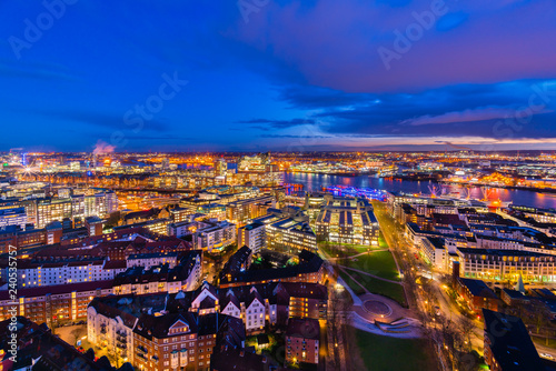 Aerial view of the Harbor District and downtown Hamburg, Germany, at dusk .