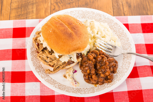 Fotografía Coleslaw on Pulled Pork BBQ Sandwich with Baked Beans and Potato Salad