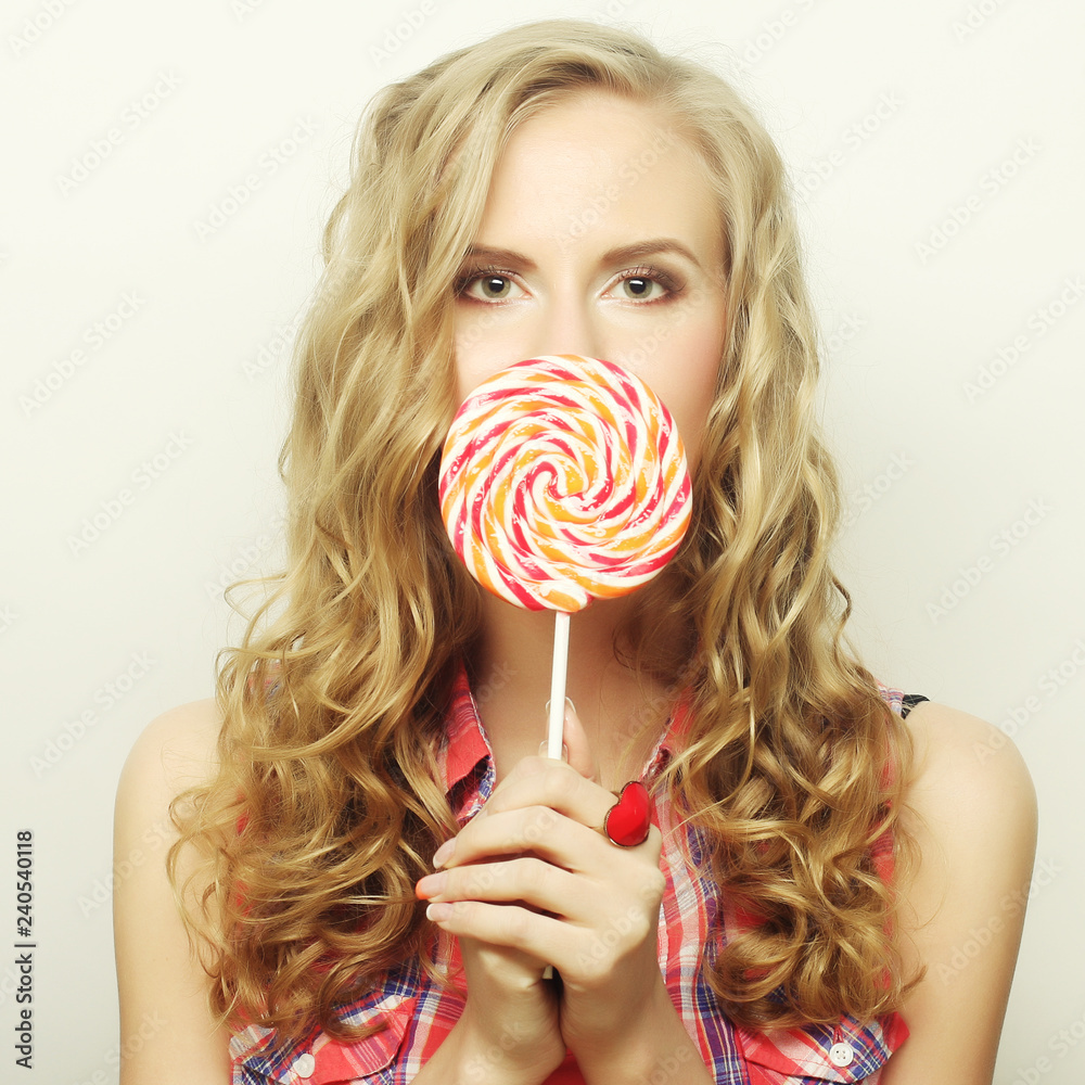 blond  girl with  lolipop