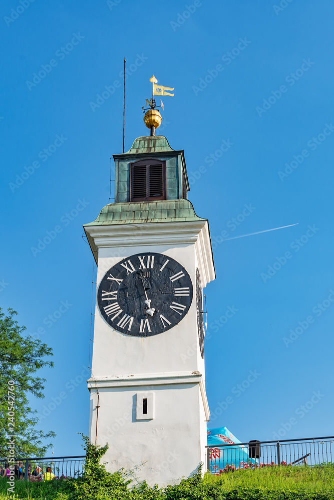 Fototapeta premium Novi Sad, Serbia - May 27, 2018: Clocktower of the Petrovaradin fortress in Novi Sad, Serbia.