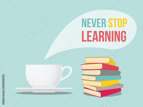 never stop learning quote sign with coffee and book stack