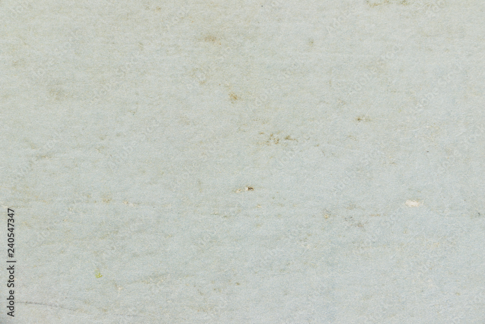 Blank cardboard and paper background. The texture of the surface of old cardboard in stains and the blank backdrop of the old book sheet. Blank cardboard and paper background. The texture of the surface of old cardboard in stains and the blank backdrop of the old book sheet.