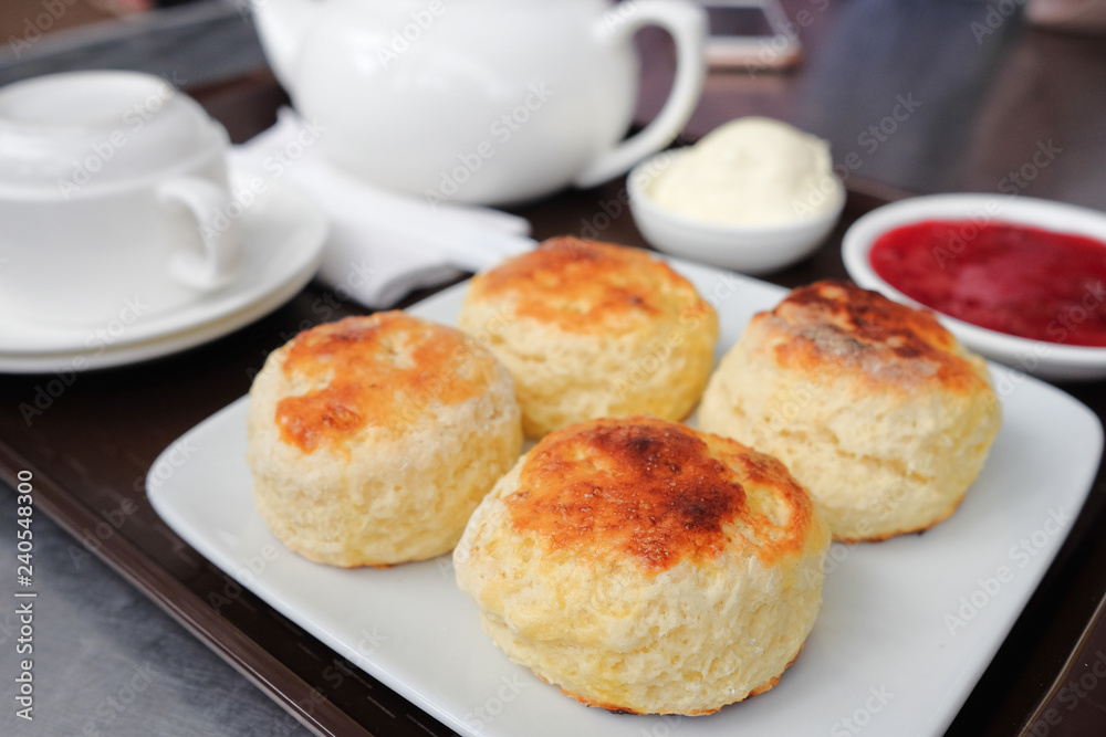 English scones set served on a table in local restaurant in Cameron Highlands. English scones set served on a table in local restaurant in Cameron Highlands.
