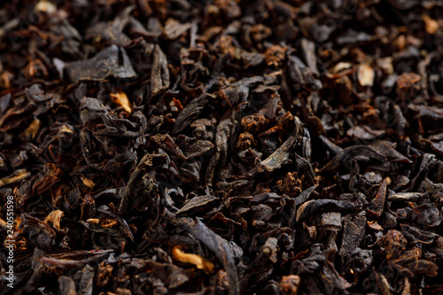 Background texture of loos leaf English breakfast black tea from India.Macro.