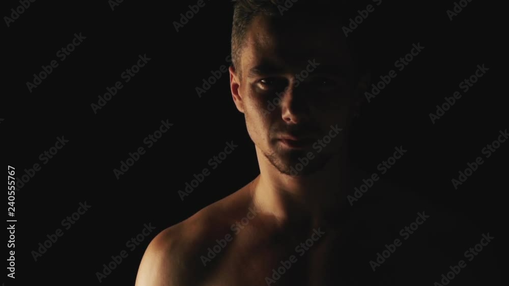 Sexy man posing on black background Sexy man posing on black background