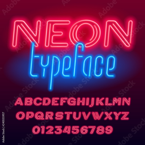 Neon tube alphabet font. Neon color oblique capital letters and numbers. Stock vector typescript for your design.
