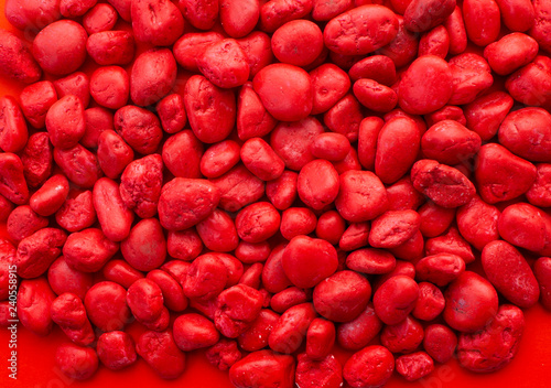 closeup of crushed red lava rock background