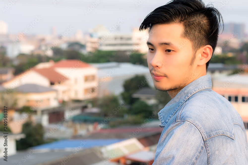 Portrait charming handsome young asian man. Attractive guy feels