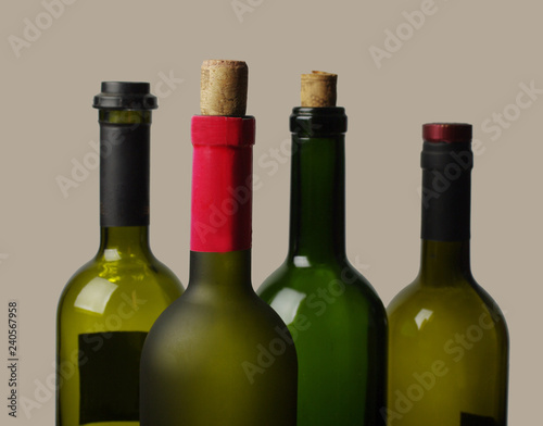 Wine bottles on a light background. A place for your text.
