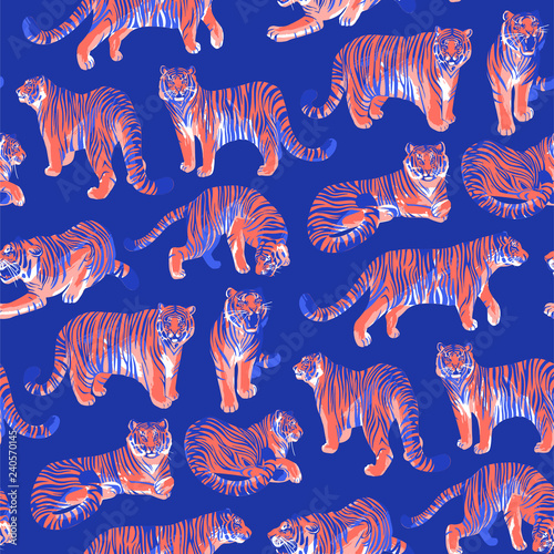 Graphic seamless pattern of tigers in different poses. © Ekaterina Glazkova
