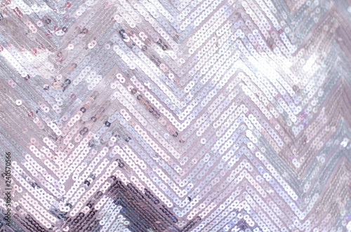 Fabric texture with shimmering silver sequins.