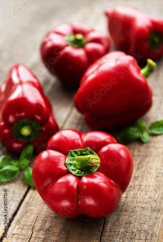 Plate with Bell peppers on a wooden background