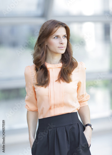 portrait of modern young woman on blurred office background Free Download portrait of modern young woman on blurred office background - GFXLoad