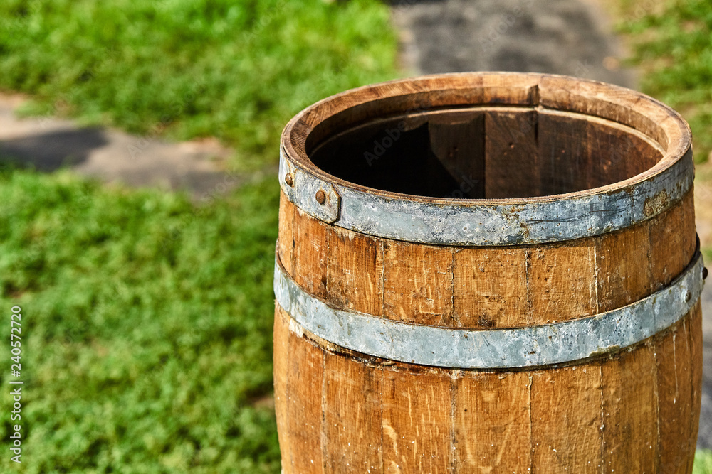 Oak Barrel. Open wooden barrel. Wooden barrel covered with wax Oak Barrel. Open wooden barrel. Wooden barrel covered with wax