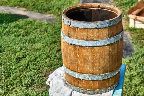 Oak Barrel. Open wooden barrel. Wooden barrel covered with wax © timltv