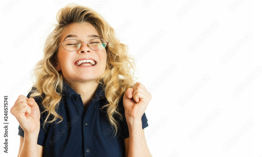 Young beautiful emotional girl rejoices and shouts on a white isolated background. Young beautiful emotional girl rejoices and shouts on a white isolated background.