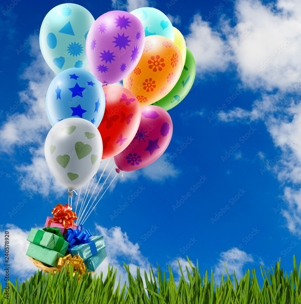 boxes with gifts in balloons against the sky