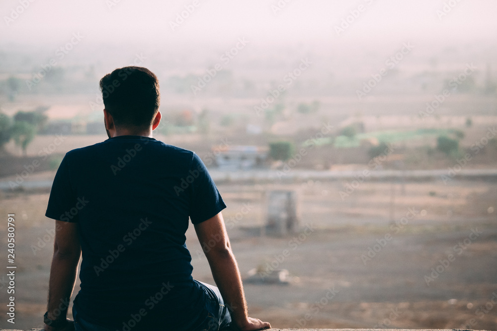 Man staring at the landscape