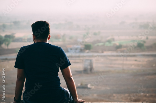 Man staring at the landscape