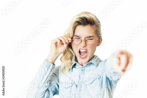 Wallpaper Mural Young beautiful girl teacher in glasses emotionally reeks and shouts with a finger. Concept is evil doctor Torontodigital.ca