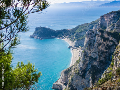 Photos Beautiful aerial view of Baia dei Saraceni with blue Mediterranean sea and a sto