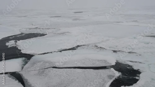 Travel on the icebreaker in the ice, Antarctica photo