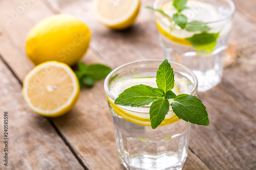 Fresh Lemonade in a Glasses with Lemon Slices and mint