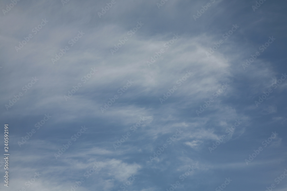 Fototapeta premium The wind brought clouds to the sky. A beautiful abstract sky background soars easily in the sky. The best pictures of the clouds we see across the sky.