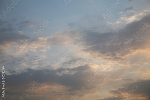 Sky clouds as the best picture. The most abstract background image of the sky. Beautiful sunset. The sun's rays illuminate the clouds.