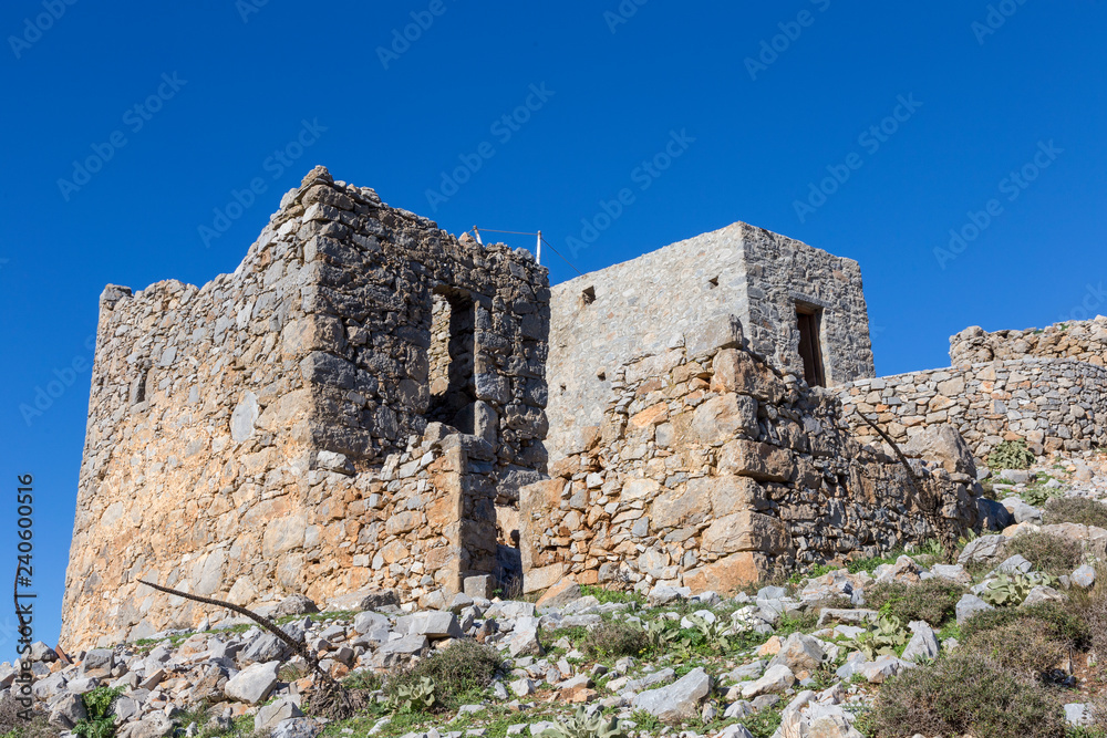 Crete, Greece 12-12-2018. Old traditional windmill in mountain. Crete, Greece.